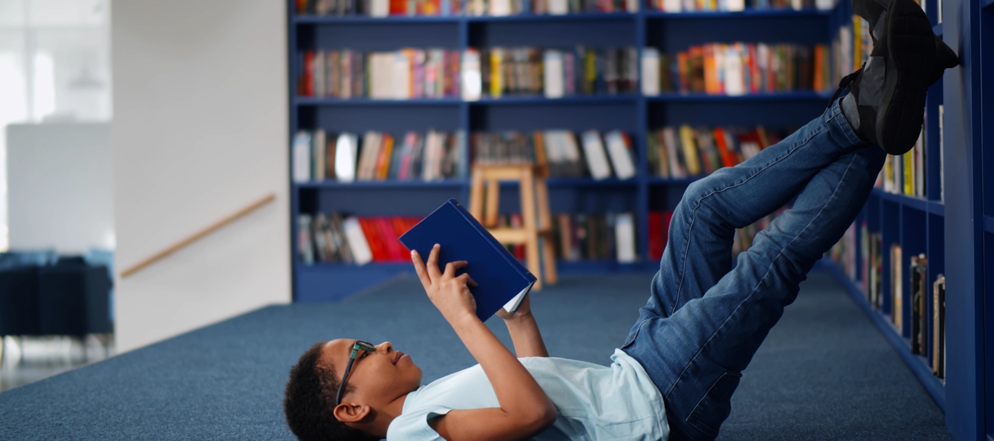 boy reading a book